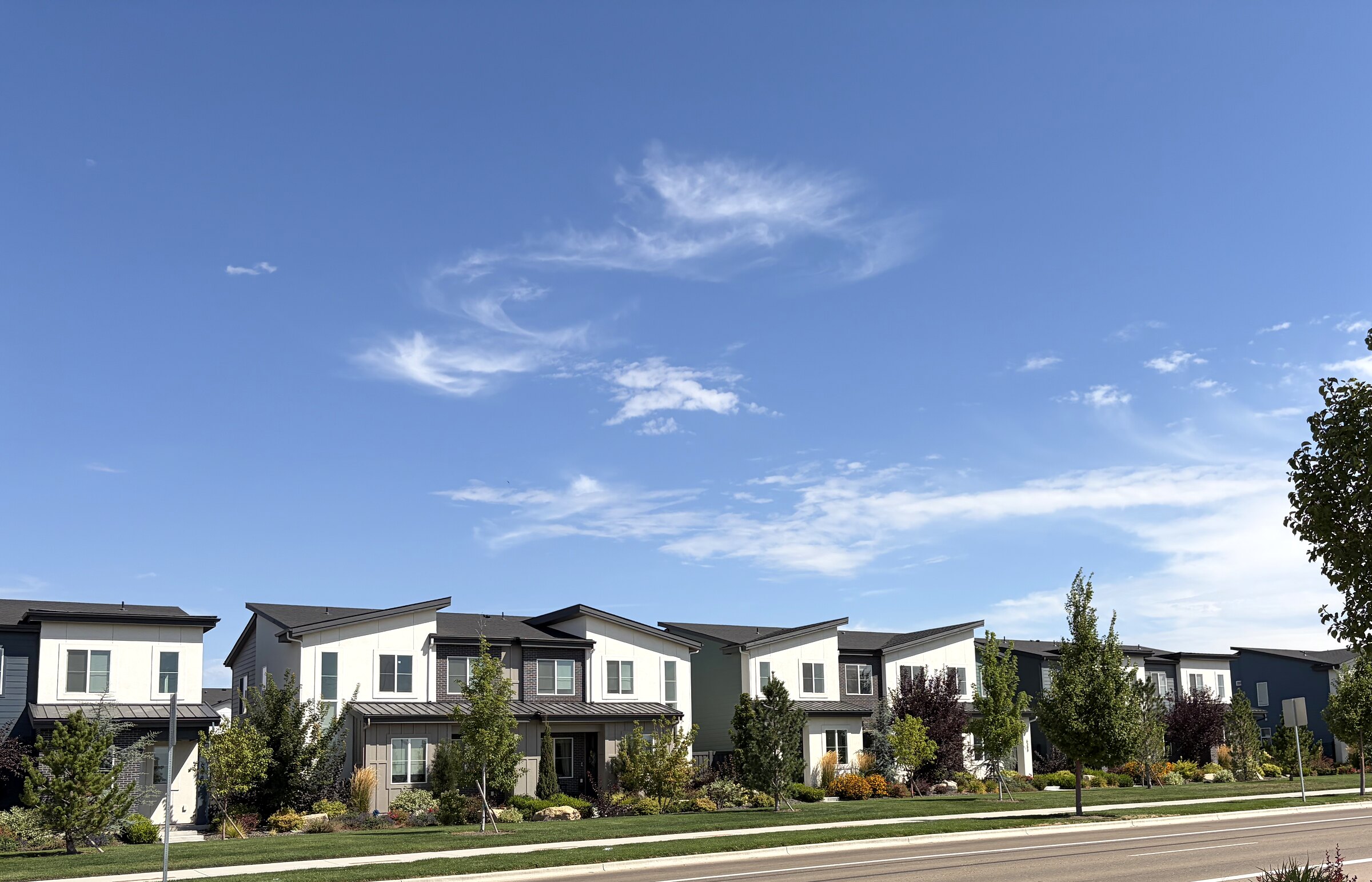 New homes along a landscaped street in Kuna