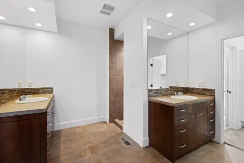 Primary bathroom, vanities on both sides