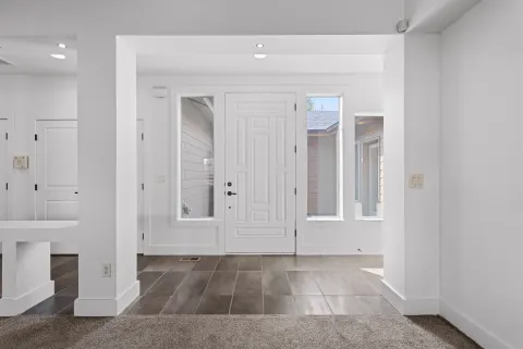 Entry hall, looking back at the front door