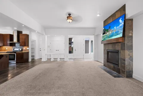 Family room, with the stone fireplace at its centre