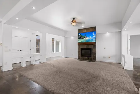 The fireplace wall, floor to ceiling