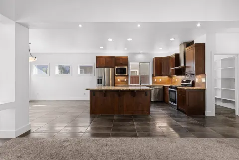 Kitchen and island, from the family room