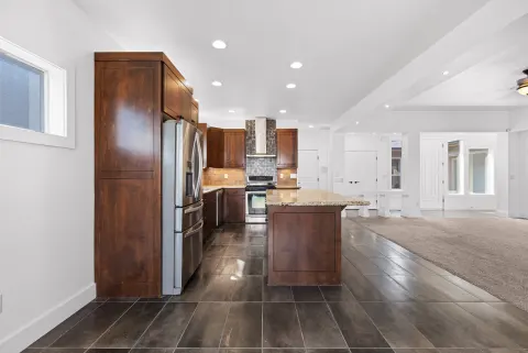 Cabinetry beside the refrigerator