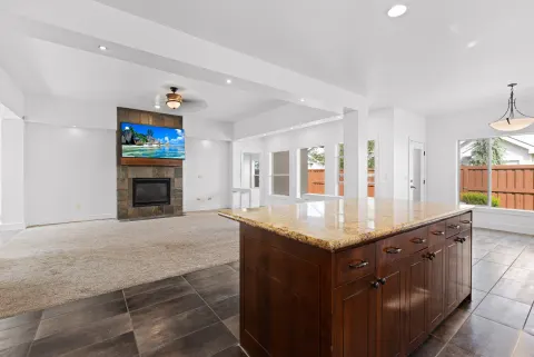 From the kitchen across to the fireplace