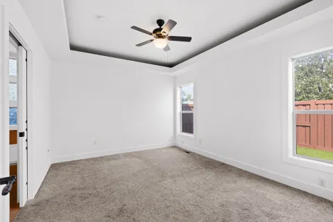 Primary bedroom, under a tray ceiling