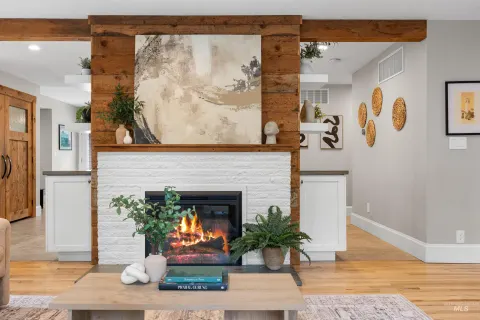 Living room, white brick and wood fireplace